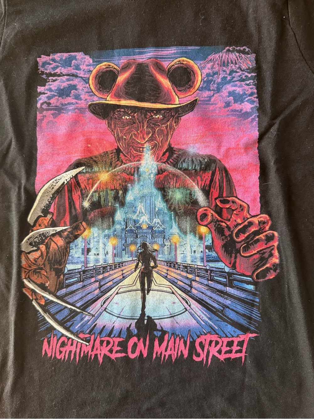 Disney’s Nightmare On Main Street Black Graphic Tee with Pink and Blue Print